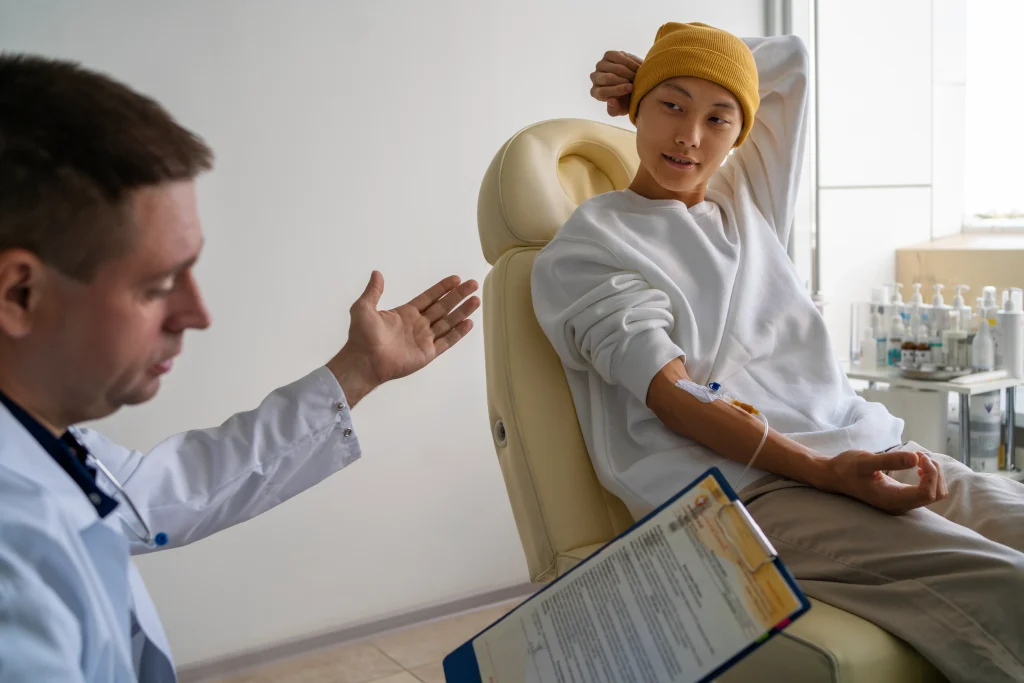 Physician consults patient about hormone balance and wellness strategies as part of the Menopause & Andropause Support program aimed at relieving fatigue, mood swings, and low libido.